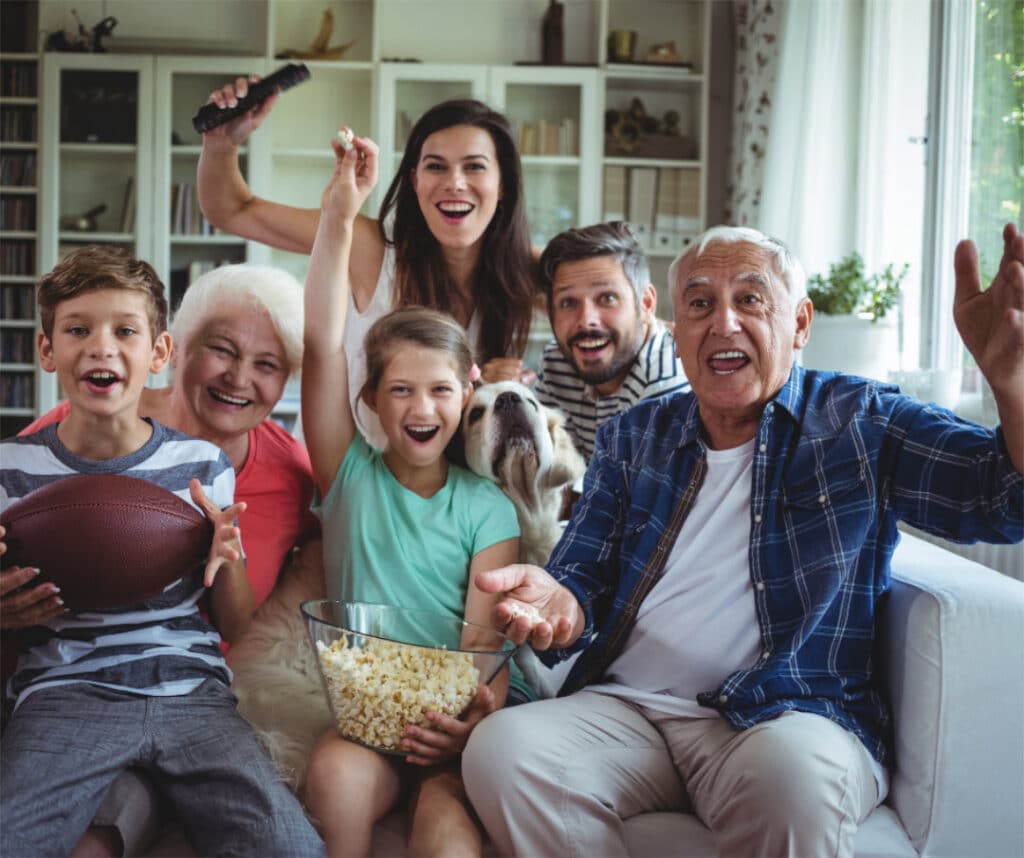 Furry Footy Fever family watching tv